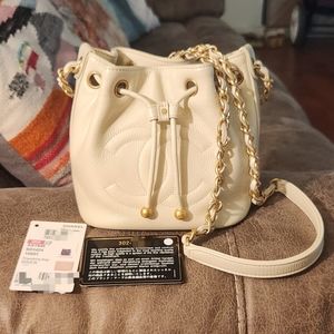Chanel Mini Drawstring Bag Shiny White Aged Calfskin Authentic